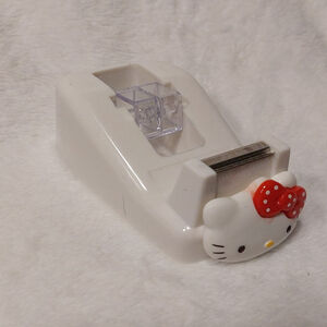 Make projects fun when you use this Hello Kitty White and Red Tape Dispenser
